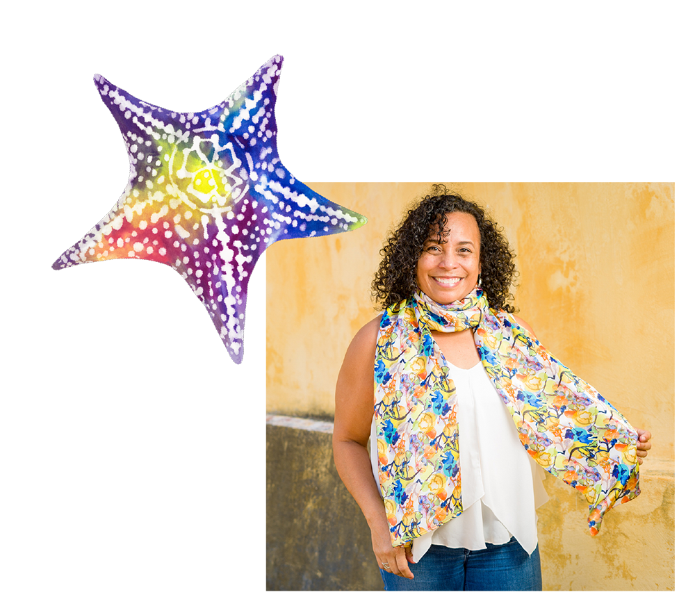 Headshot of Debbie Sun wearing art scarf with watercolor starfish graphic